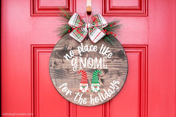 round christmas sign on door